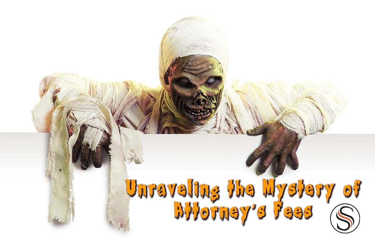 Halloween Mummy looking at Attorney Fees - Unraveling the Mystery text