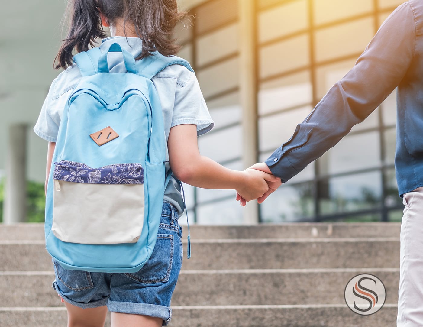 Divorced father walking daughter to school